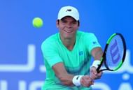 ABU DHABI, UNITED ARAB EMIRATES - DECEMBER 31:  Milos Raonic of Canada in action against Andy Murray of Great Britain during the play-off match for third place of the Mubadala World Tennis Championship at Zayed Sport City  on December 31, 2016 in Abu Dhabi, United Arab Emirates.  (Photo by Francois Nel/Getty Images)